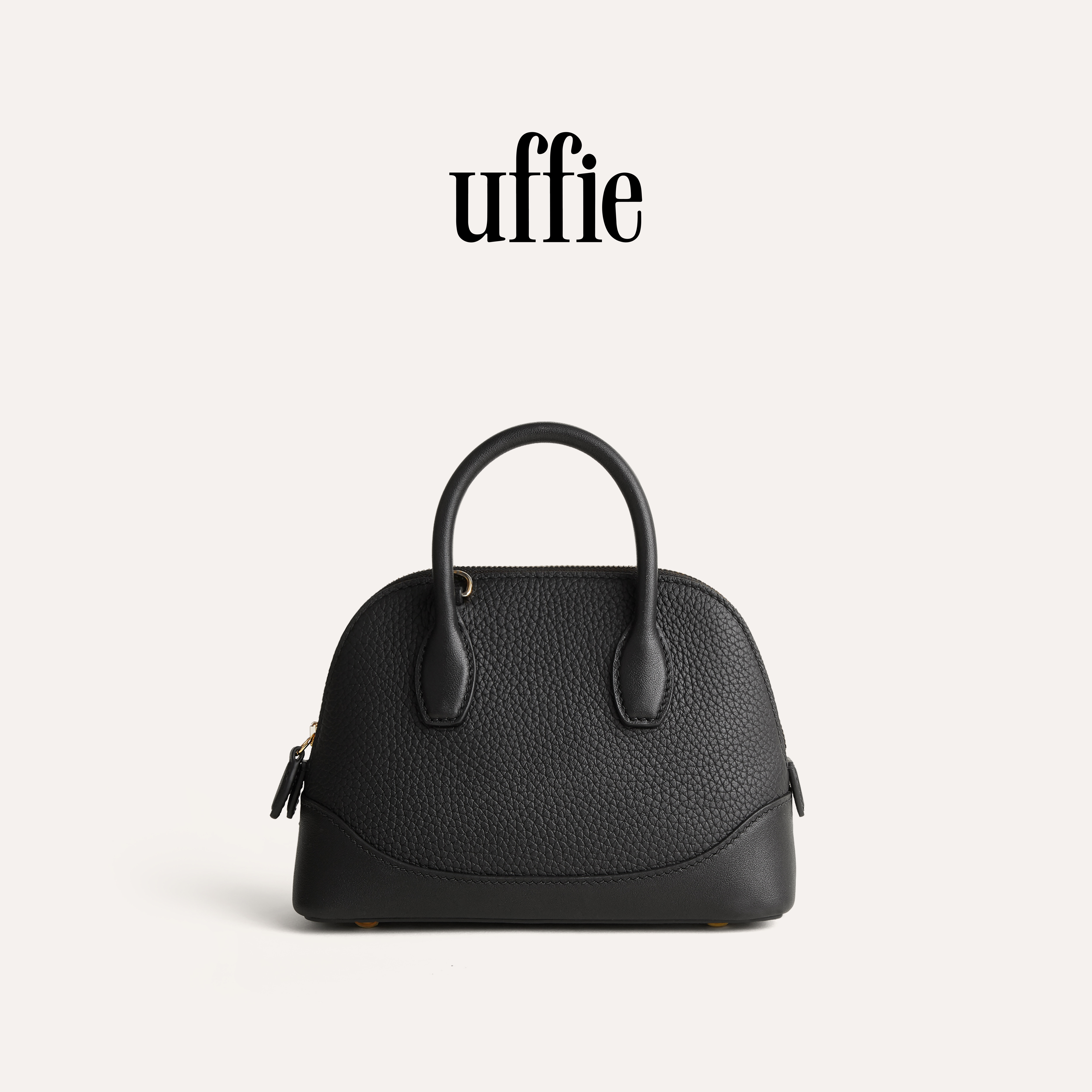 UFFIE于绘笑脸包手提包