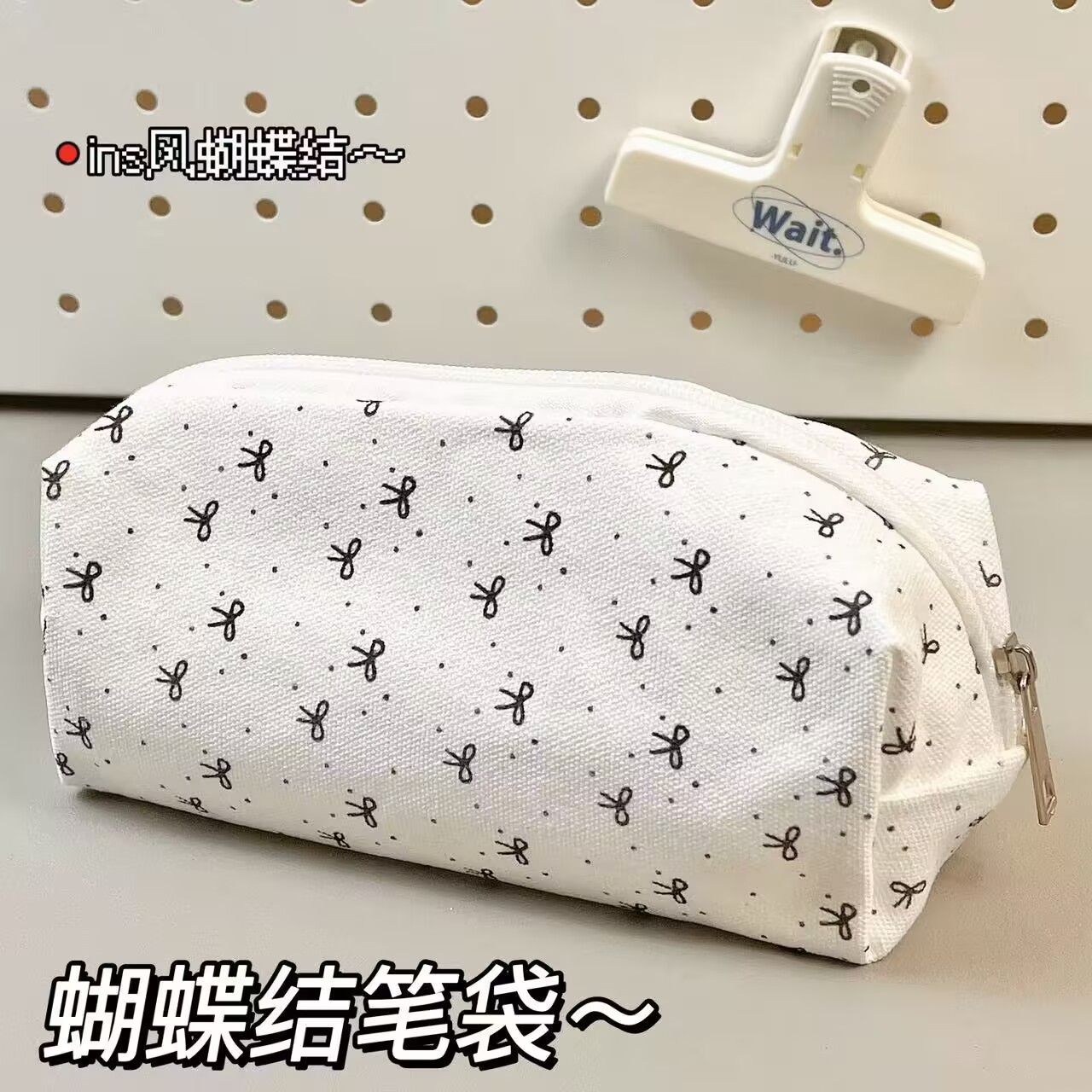 手拿黑蝴蝶结笔袋ins高颜值可爱少女学生化妆包大容量文具手拿包