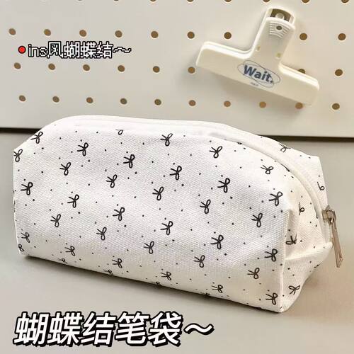 手拿黑蝴蝶结笔袋ins高颜值可爱少女学生化妆包大容量文具手拿包