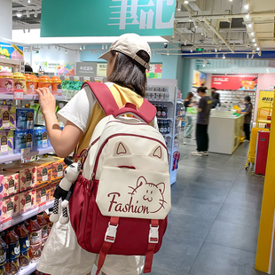 儿童书包女生小学生2024新款大容量多层大学生高中初中生双肩背包