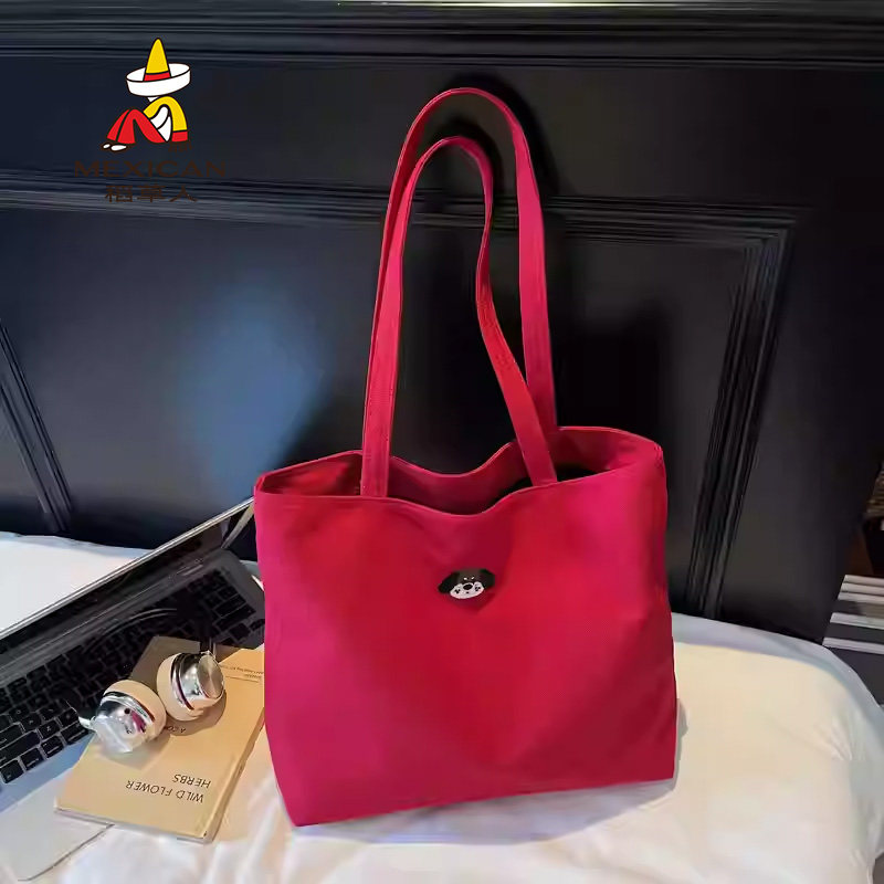 稻草人大容量红色刺绣小狗帆布包包女时尚百搭手提包学生通勤包