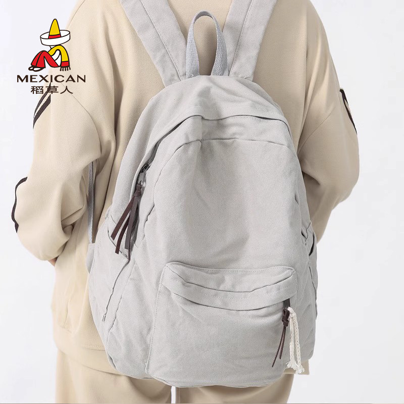 稻草人大容量帆布双肩包女纯色简约文艺风大学生上课通勤双肩包