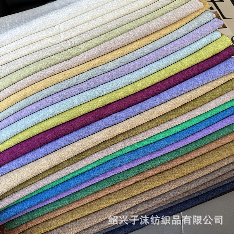 现货6124#春夏TR仿麻肌理感素色面料西装裙子外Z套套装面料