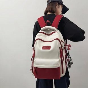 大容量书包女初中生简约高中生大学生男孩小学生五六年级双肩背包