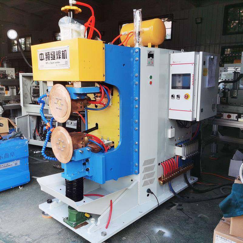 山东炬源FTB-160银瓦交流变频滚焊机铁油箱横缝焊接滚轮式缝焊机