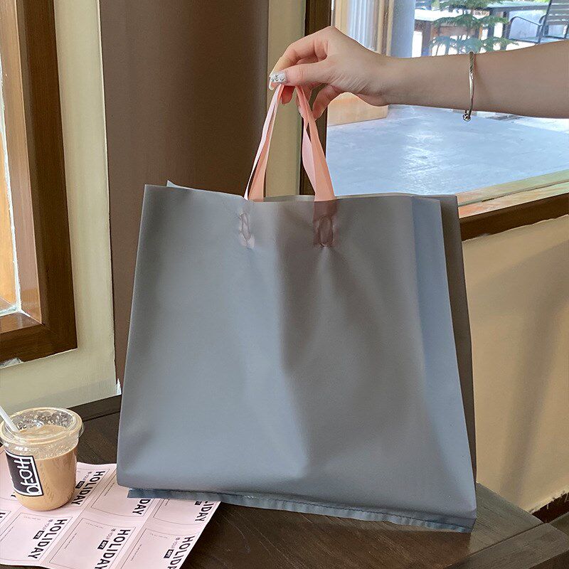 高档磨砂服装店女装装衣服用手提袋子塑料袋现货礼品包装打包