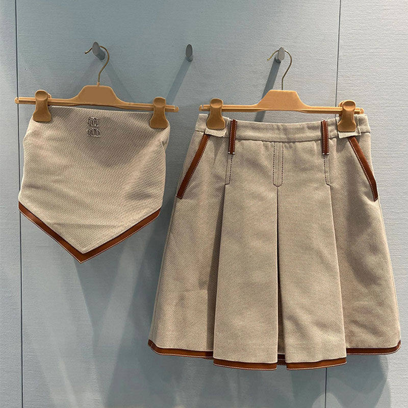 高端欧货女装2024新款抹胸皮扣上衣+压褶半身裙套装