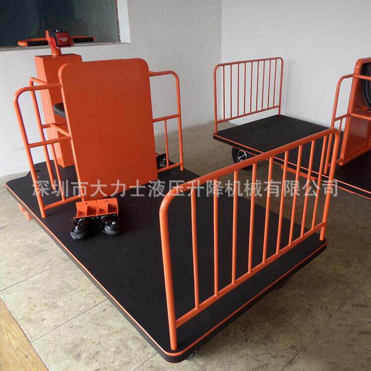 站驾式电动平板车电动牵引平台车自走式牵引拉货车