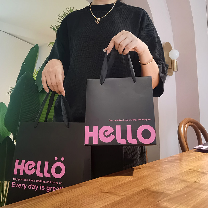 大牌范服装店手提袋高级感黑色礼品袋订制logo购物袋加厚纸袋子