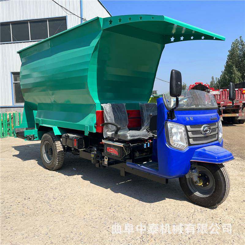 五方螺旋内部柴油撒料车喂牛羊用青储投草车三轮式左右出料投料车