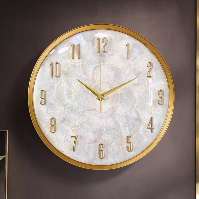 现代轻奢贝壳挂钟简约时尚客厅家用钟表2023新款网红创意挂墙时钟