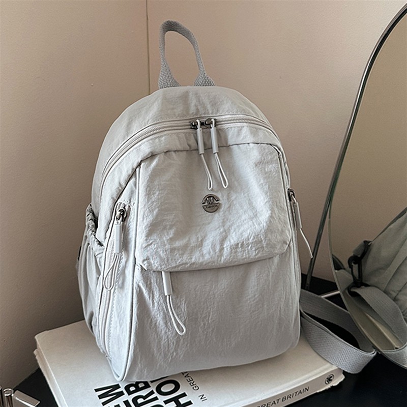 2025新款户外旅游双肩揹包百搭休闲 简约轻便二合一两用胸包通勤