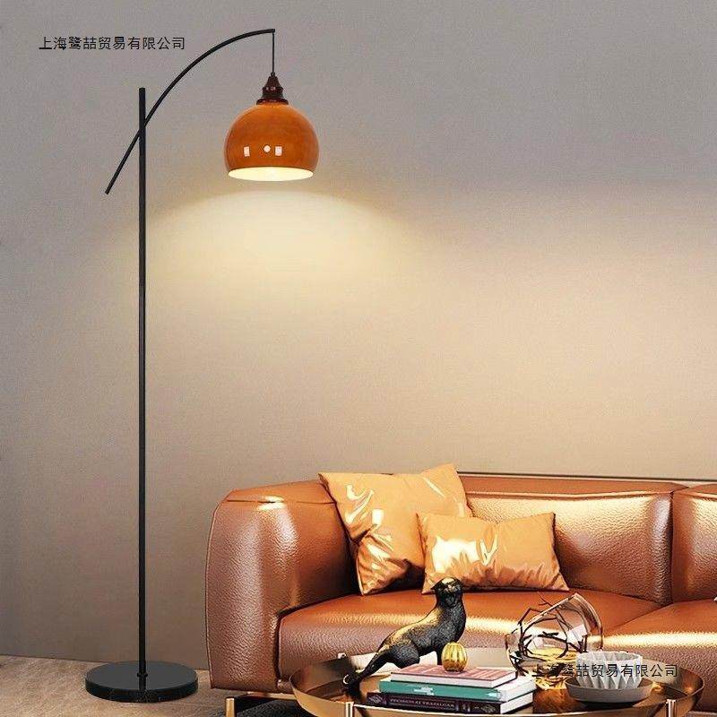 北欧落地灯设计师新款中古风客厅沙发旁氛围灯日落橙卧室立式台灯
