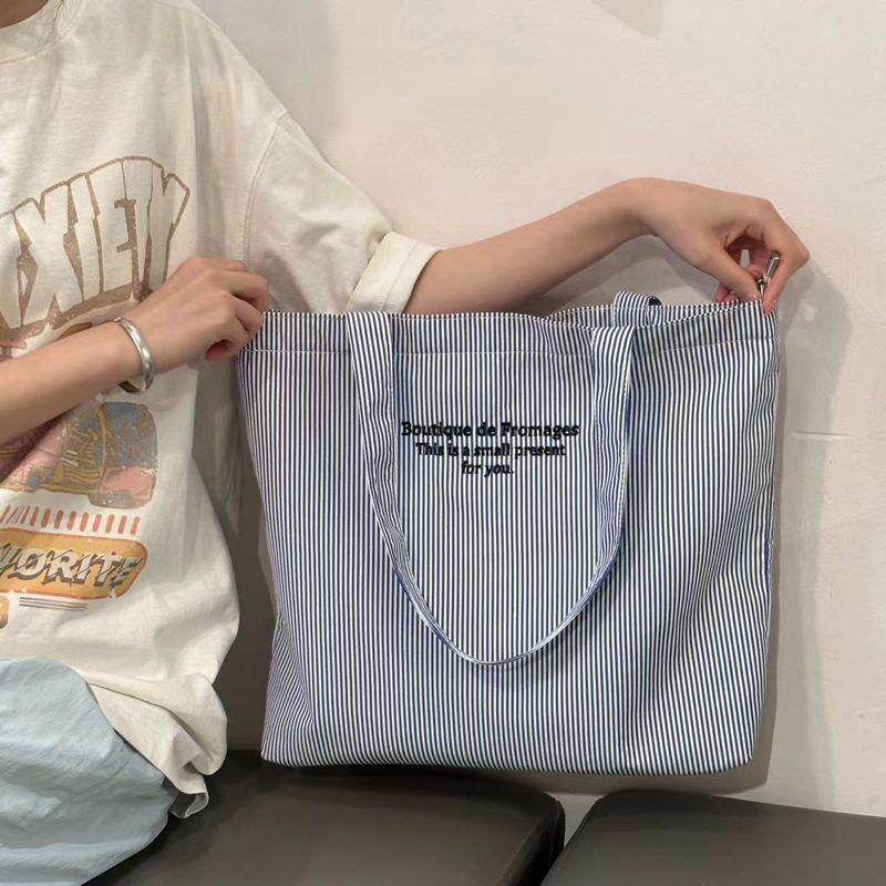 新款休闲条纹慵懒简约2025通勤帆