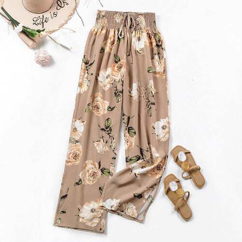 A women's black base pink flower Wide Legged Pants suitable