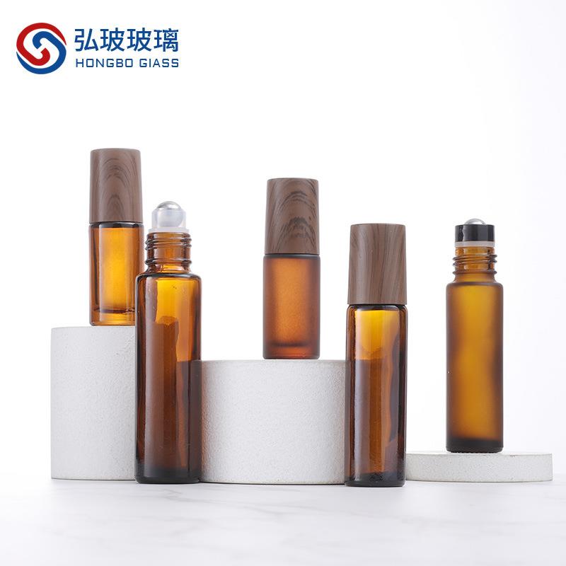 跨境现货10ml木纹盖茶色玻璃滚珠瓶精油瓶香水瓶走珠瓶唇油分装瓶