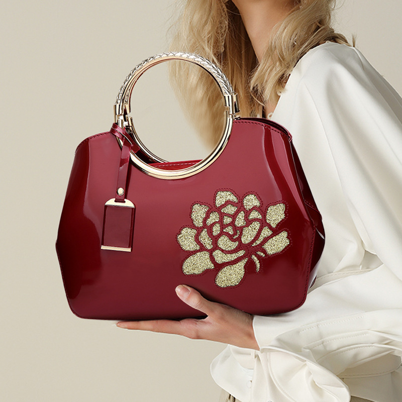 包包女新款冬红色2025时尚漆皮