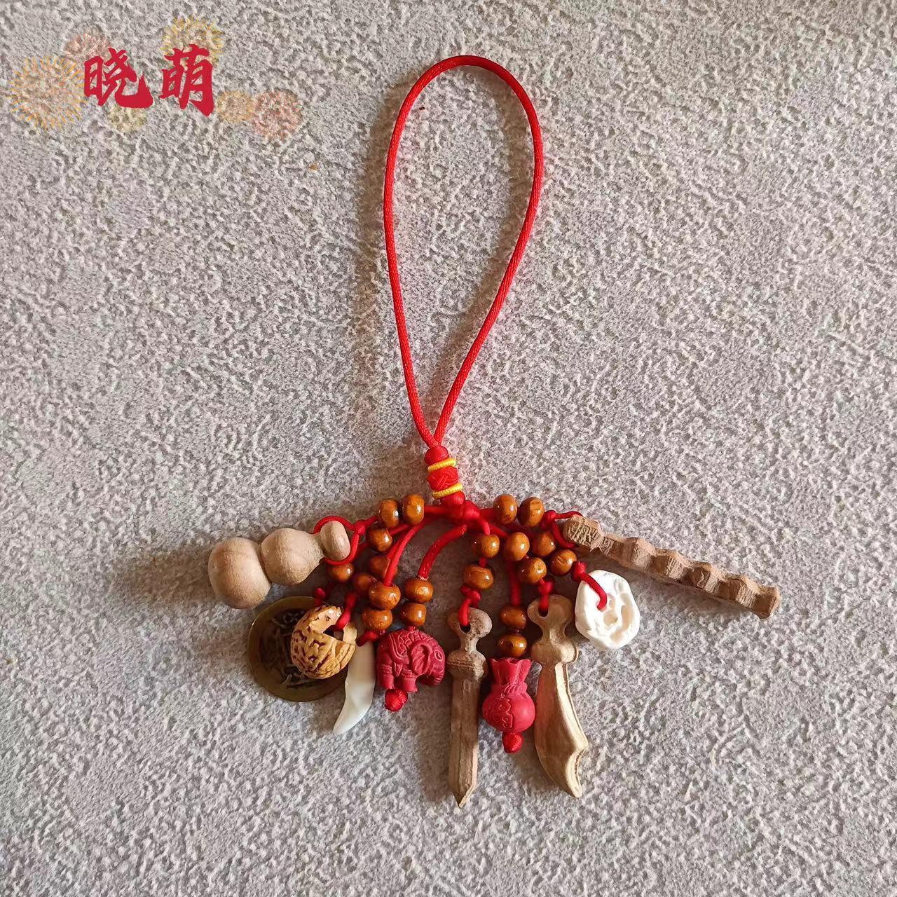 厂家红绳桃木挂件狗牙葫芦铜钱桃木剑纯手工编制