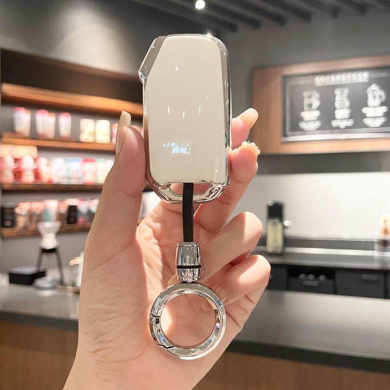 适用起亚狮铂拓界KX3奕跑智跑K5男士女情侣小车锁匙扣壳钥匙包套