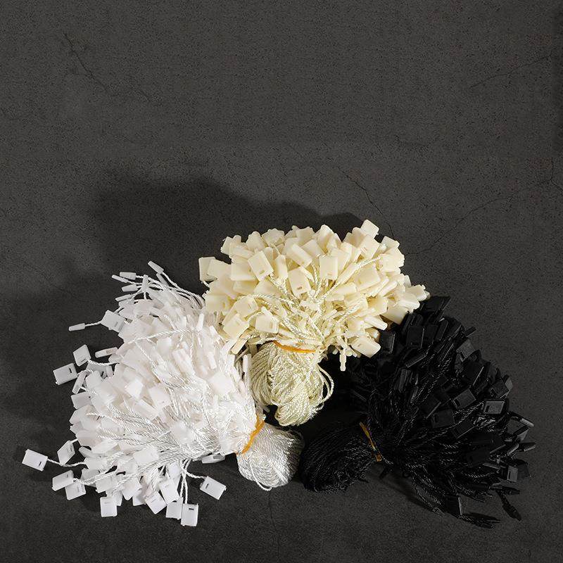 服装辅料厂家直供服装吊牌绳现货吊绳塑料服装吊牌通用吊粒吊牌绳