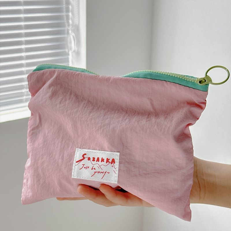 马卡龙收纳包撞色设计