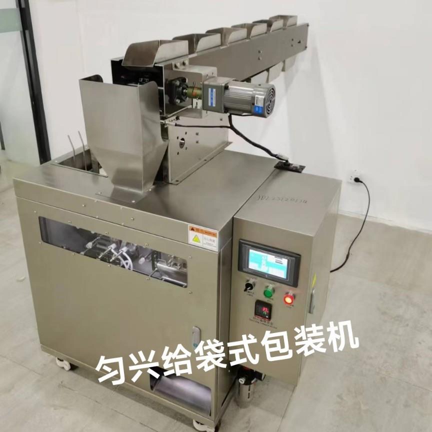五金配件自动包装机全自动料斗式年货干干果定量香蕉片给袋封口机图片