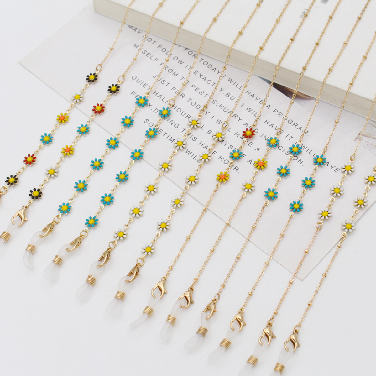 速卖通时尚潮流两面小雏菊滴油链条防掉gm眼镜链项链现货工厂