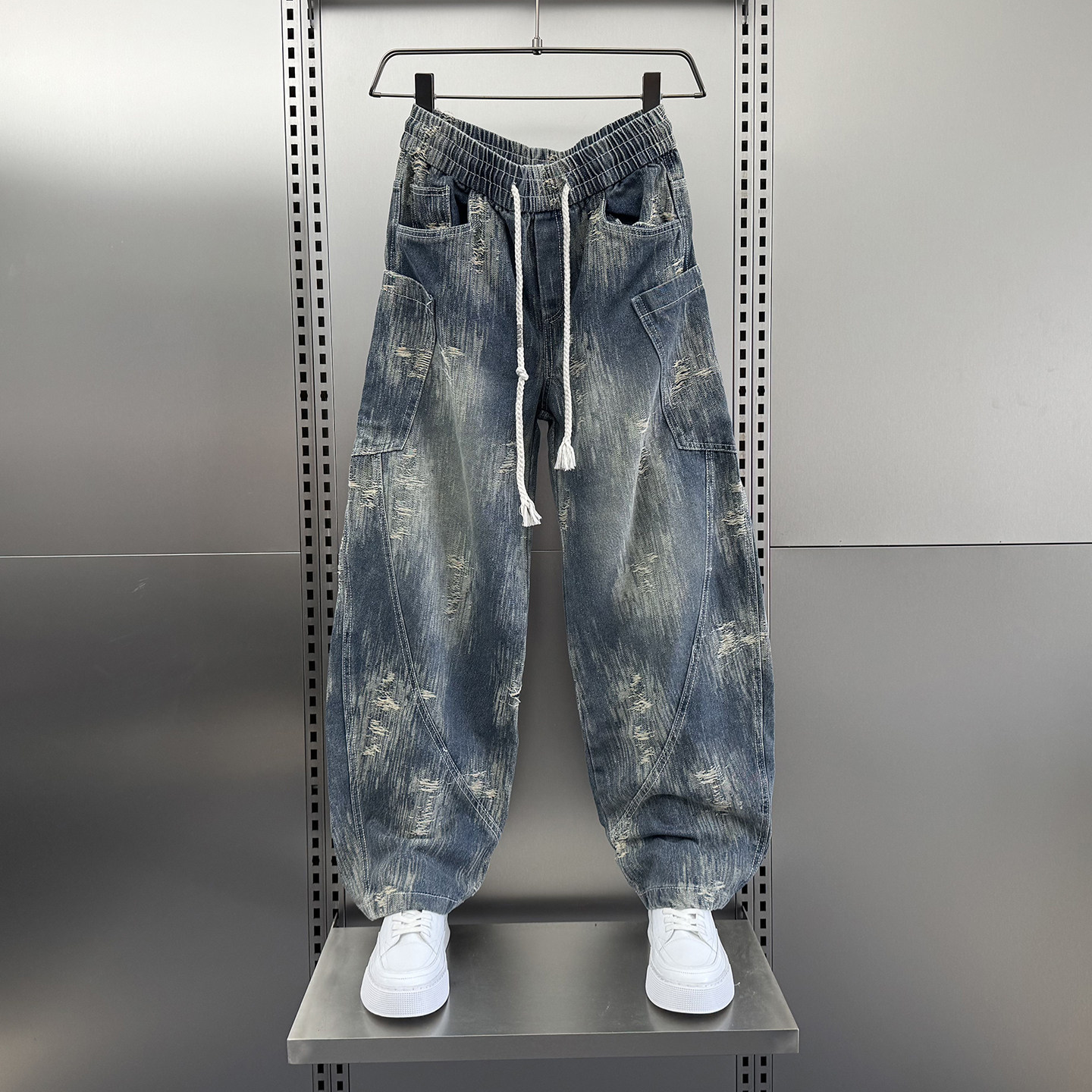 2025秋季痞帅水洗磨破弯刀牛仔裤