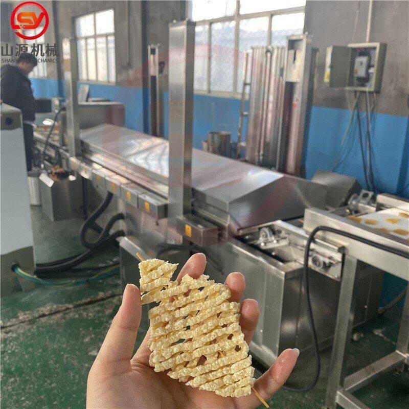 自动化豆腐串油炸机设备 豆干油炸机 连续式炸兰花干的油炸机器