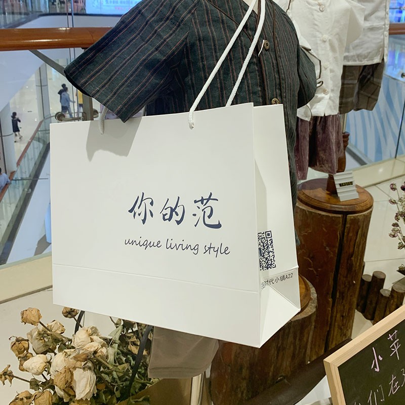 服装店袋子定做女装店纸袋手提袋定制童装购物袋加厚