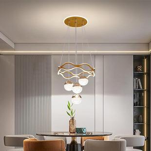 轻奢餐厅吊灯现代简约大气楼梯吊灯创意天鹅吊灯金色四头吊灯
