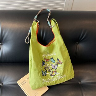 ins刺绣蝴蝶尼龙包2025新款夏季薄款休闲帆布包大容量托特单肩包