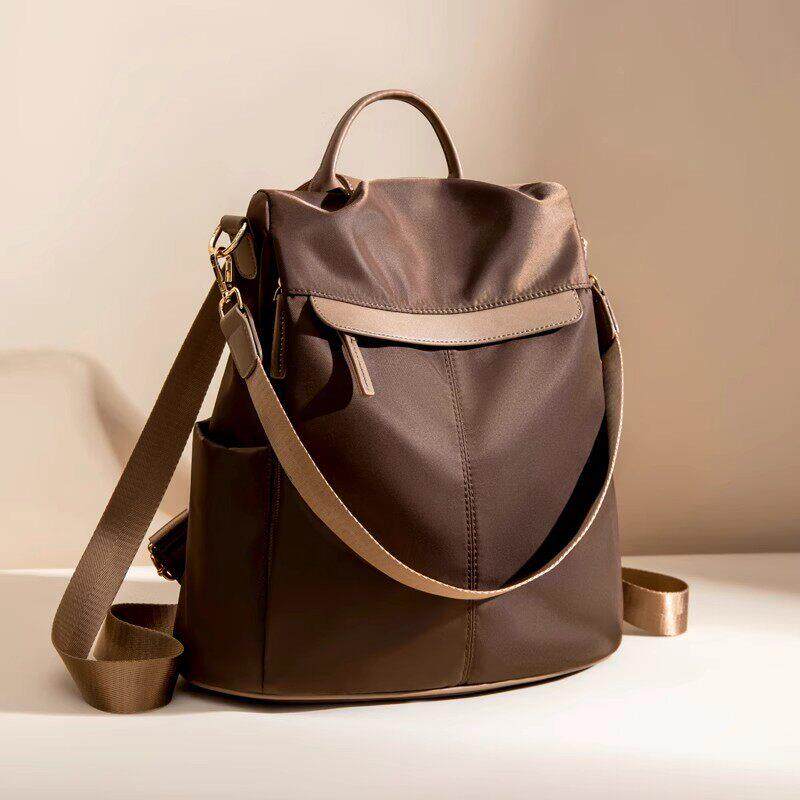 代购2025新款防盗双肩包津布揹包时尚百搭轻便包宠物包旅游旅行包