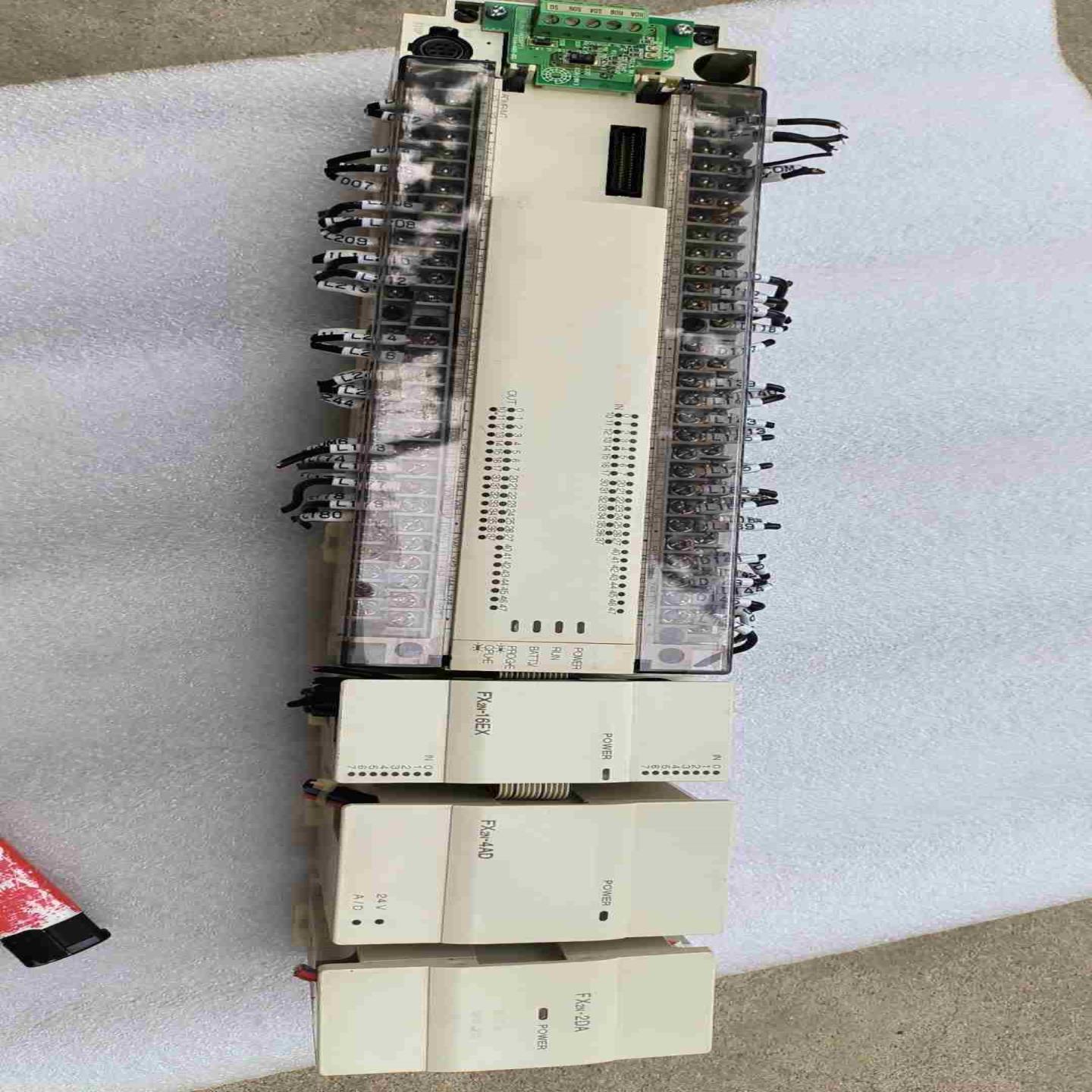 PLC一套FX2N-80MR-001,FX2N-2AD,询价