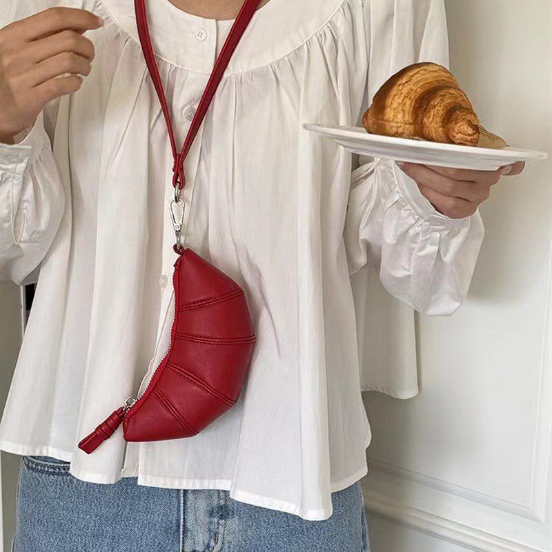 迷你挂脖小零钱钥匙包设计感小众凹造型斜挎口红耳机包可颂牛角包