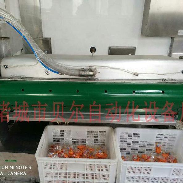 供应风味龙虾滚动式真空包装设备-BEIER1000型，诸城贝尔生产厂家