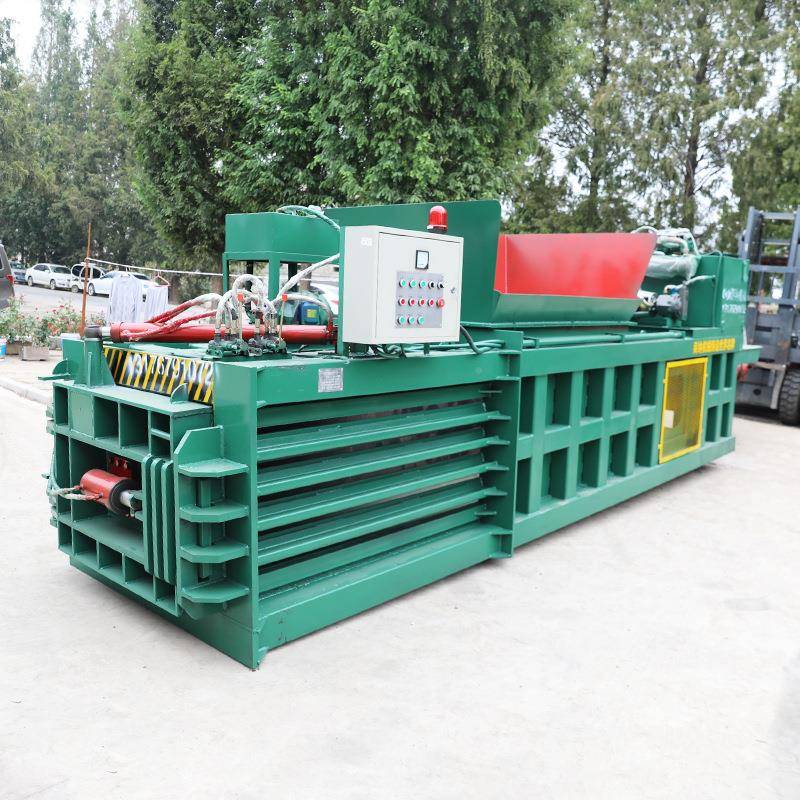 玉米秸秆卧式液压打机漆桶包料瓶打包机废衣120T油物棉花打塑包机