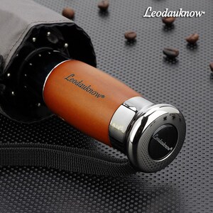 欧士多娜10骨全自动折叠加大加固黑胶防晒遮阳创意商务晴雨两用伞