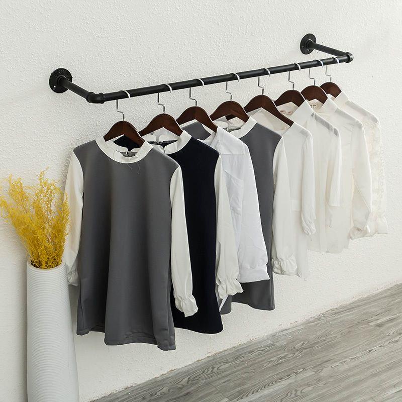 铁艺钢管简约服装店衣服展示架上墙壁挂式侧挂货架女装店铺挂衣架图片