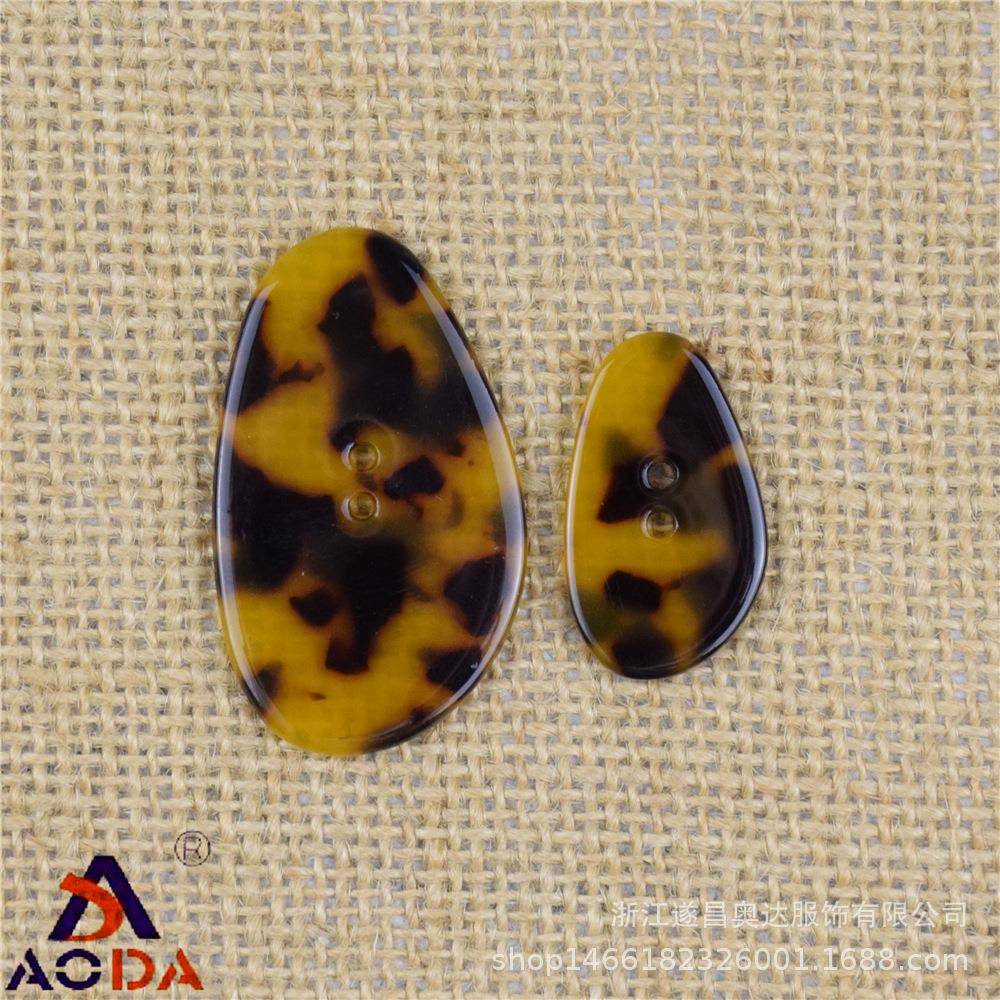 醋酸饰钮异型两眼装纽扣753号服装辅料饰配FRC扣件厂品家现货