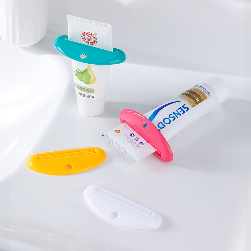 挤牙膏神器牙膏夹子洗面奶护手霜挤压器手动挤牙膏软管小样卷压器