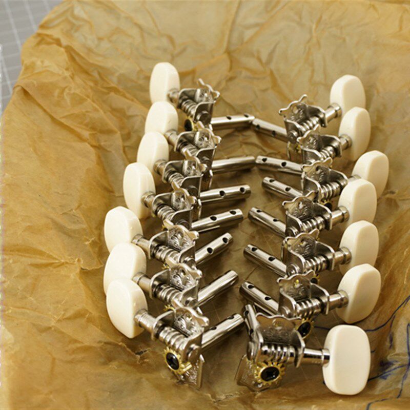 红棉吉他大全旋钮古典民谣吉他通用旋钮弦钮椭圆梅型质弦钮