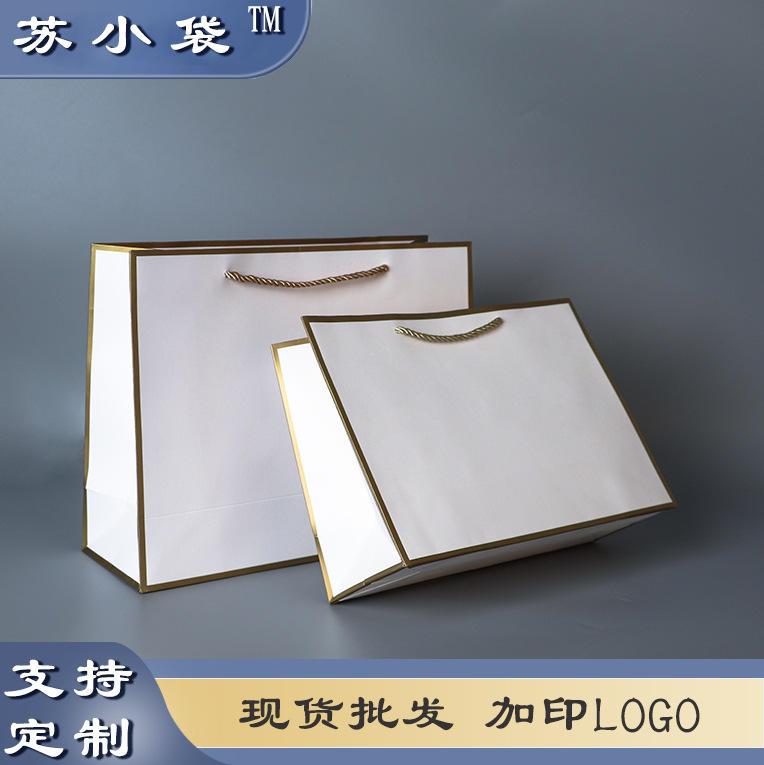 服装店手提纸袋印logo高档衣服礼品购物女装手拎包装金框手提爆款