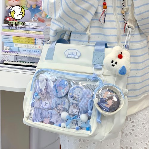 痛包斜挎包女高颜值透明娃包学生