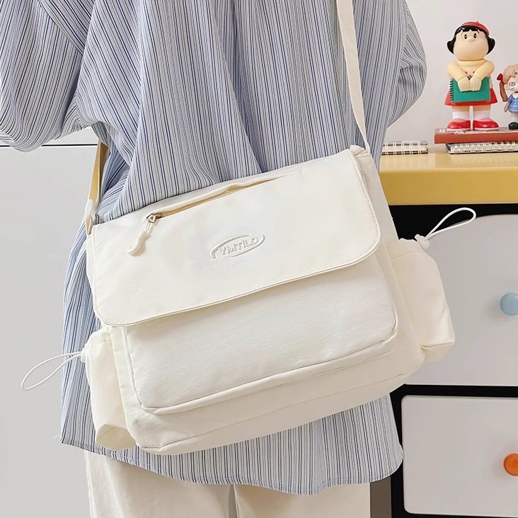 白色防水斜挎包日系高颜值邮差包简约轻便学生上课斜跨包单肩包女,箱包皮具/热销女包/男包,通用款女包,淘宝优惠券,粉丝福利购,淘宝优惠卷