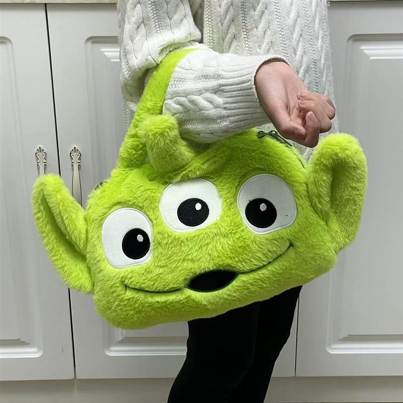 抱枕毯卡通可爱三眼仔拎包毯子包一体抱枕车载休息毯办.公室休息