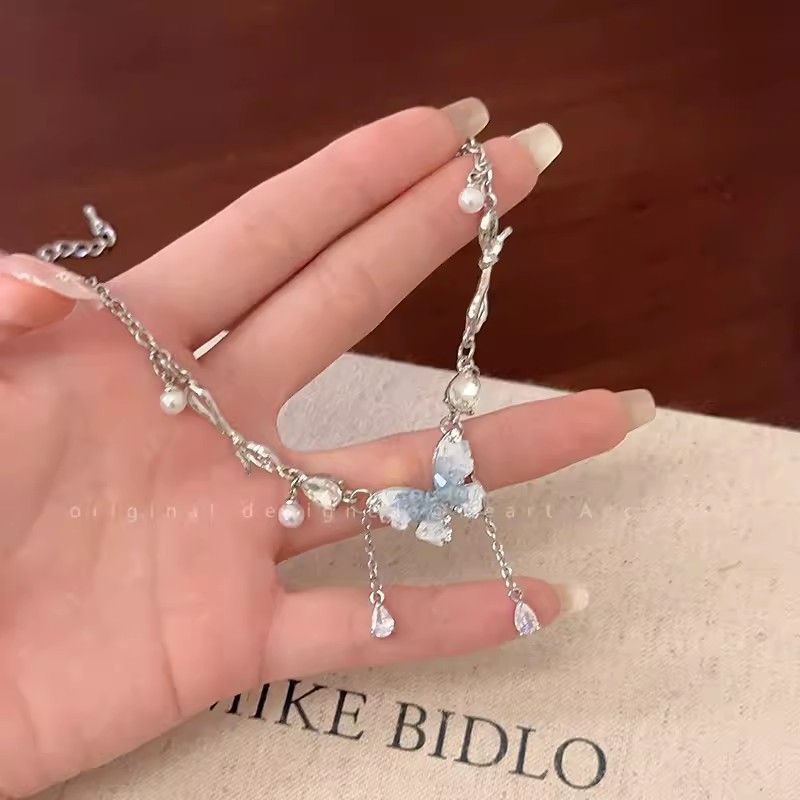 蓝色水晶蝴蝶双层珍珠项链蓝色水晶蝴蝶双层珍珠项链女款清冷感叠