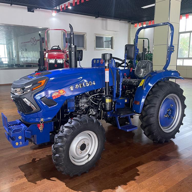 70马力四轮拖拉机 东方红水旱两用四轮旋耕机 农用耕地还田机