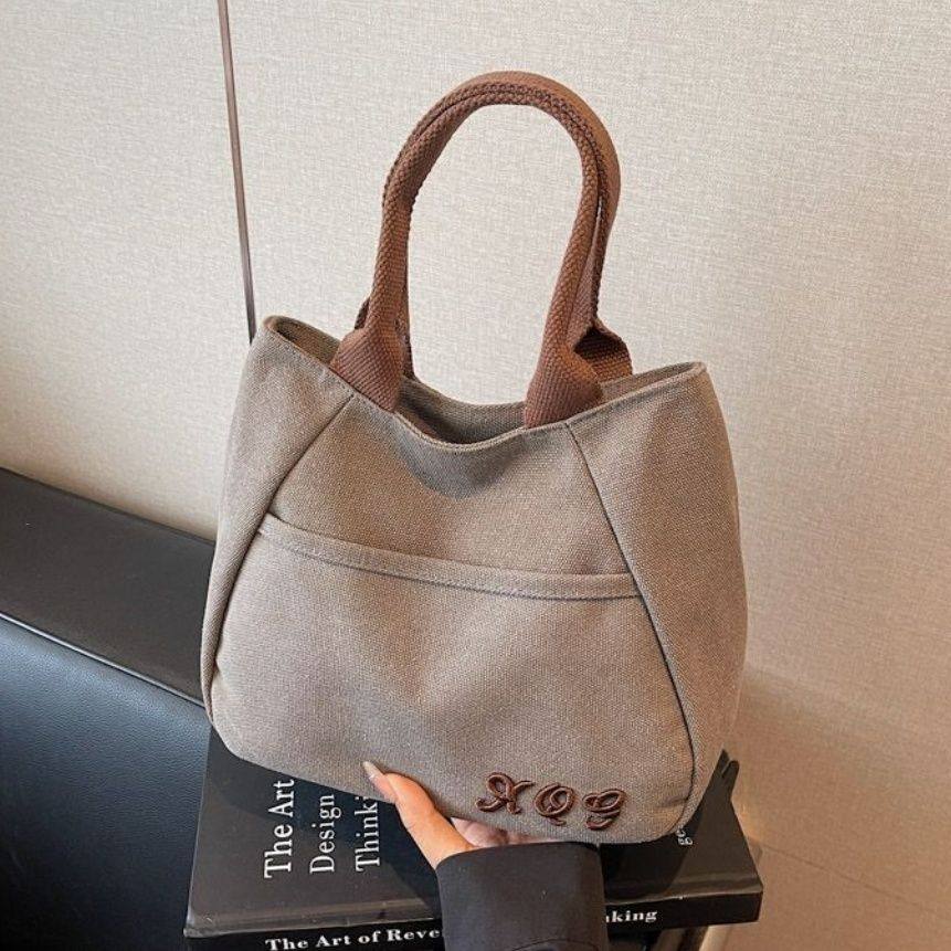 小众帆布包女出门上班小拎包通勤托特包新款日常百搭饭盒手提包
