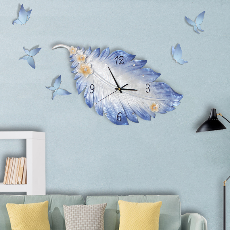 创意北欧极简挂钟客厅餐厅轻奢钟表网红羽毛艺术时尚家用欧式时钟